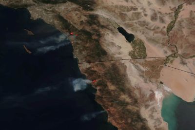 A NASA picture of large wildfires burning across sections of northern Baja and southern California. PHOTO BY NASA VIA ASSOCIATED PRESS